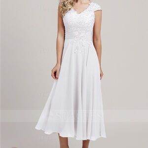 White beautiful wedding wedding or quinceanera dress. Bust: 36 waist: 29.5 NEW
